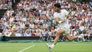 Carlos Alcaraz playing Tennis at the Wimbledon Championships